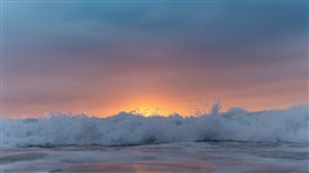 Sunset Over the Waves