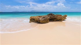 a lonely rock on the seashore